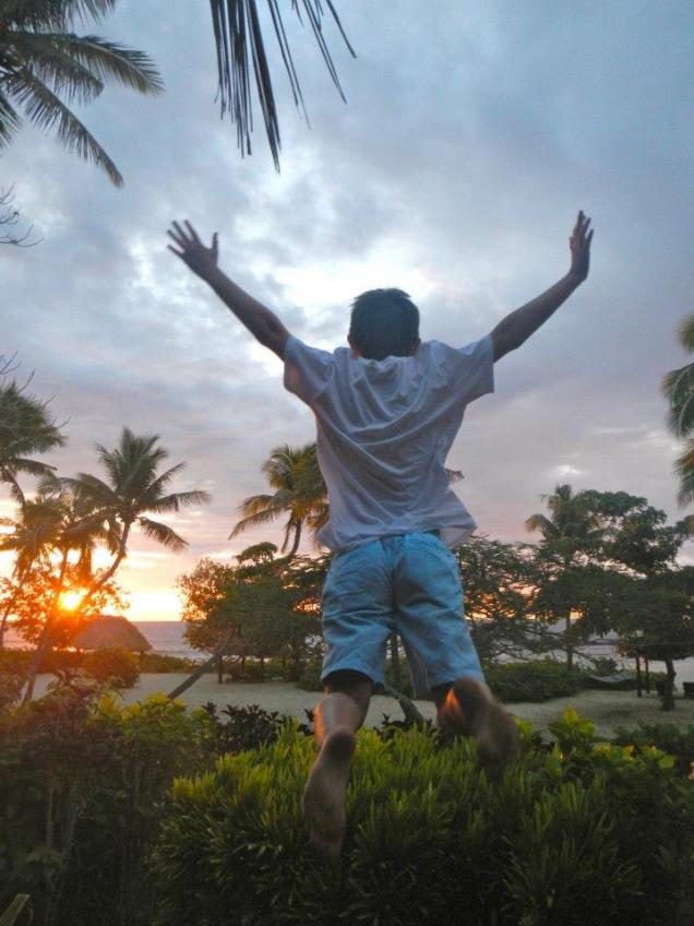 TomO jumping into life (looking like a skydiving arch)